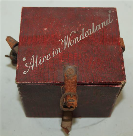 A set of twenty four Alice in Wonderland magic lantern slides,